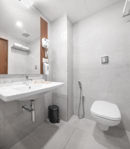 Koupelna v ubytování Hotel Turmeric