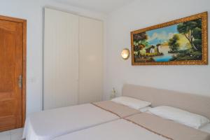 Ένα ή περισσότερα κρεβάτια σε δωμάτιο στο Apartments In Los Cristianos, Tenerife, Canary Islands