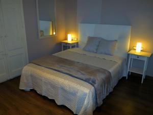 A bed or beds in a room at Apartment Sant Francesc