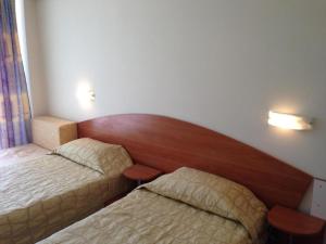 Ένα ή περισσότερα κρεβάτια σε δωμάτιο στο Hotel Pliska - All Inclusive Light