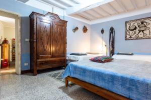 Postel nebo postele na pokoji v ubytování Le Cisterne B&B