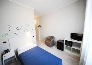 Posteľ alebo postele v izbe v ubytovaní Hp Fly Hotel Bologna