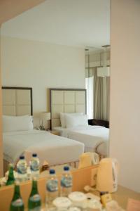 Krevet ili kreveti u jedinici u objektu The Hill Hotel & Resort Sibolangit Powered by Archipelago