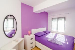 Postel nebo postele na pokoji v ubytování Apartment Atlant