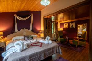 Ένα ή περισσότερα κρεβάτια σε δωμάτιο στο Chinchilla Lodge