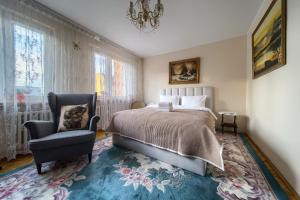 Posteľ alebo postele v izbe v ubytovaní Szczepin Spacious Apartment