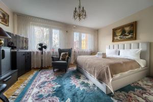 Posteľ alebo postele v izbe v ubytovaní Szczepin Spacious Apartment