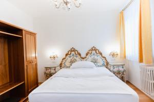 Voodi või voodid majutusasutuse Austria Classic Hotel Wolfinger - Hauptplatz toas +37 fotot