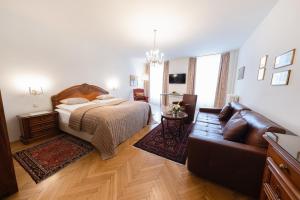 Rúm í herbergi á Austria Classic Hotel Wolfinger - Hauptplatz