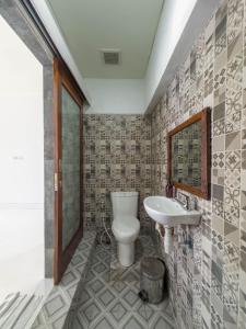 Koupelna v ubytování Giriya Amerta Hotel