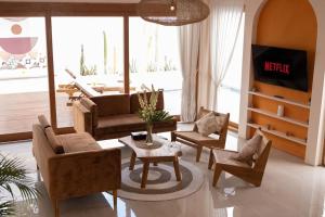 Coin salon dans l'établissement Villa Umi Paradise Bliss 3BD Villa in Prime Area