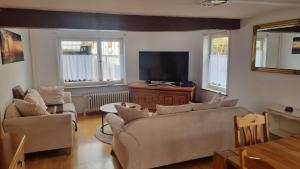 TV a/nebo společenská místnost v ubytování Lindenhof - Zentral zwischen Marburg und Gießen + 10 fotografií
