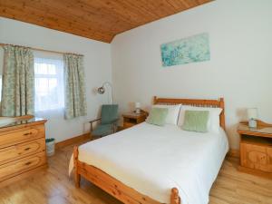 Postel nebo postele na pokoji v ubytování Rose Cottage