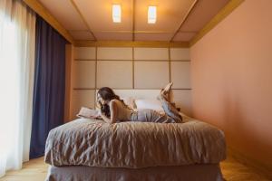 Voodi või voodid majutusasutuse Aparthotel Craiova toas