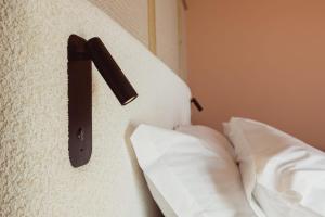 Voodi või voodid majutusasutuse Aparthotel Craiova toas