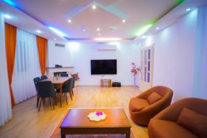 A television and/or entertainment centre at Villa SOLEMARE DEMRE