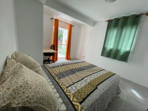 Postel nebo postele na pokoji v ubytování Appartement bord de mer Kay Dominik