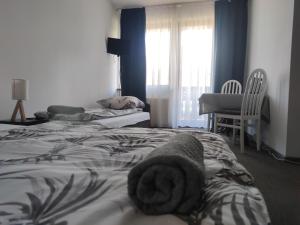 Postel nebo postele na pokoji v ubytování Willa LiMoni