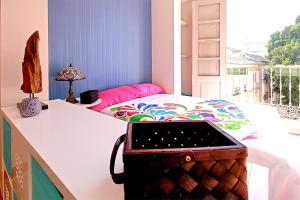 Postel nebo postele na pokoji v ubytování Livemálaga Carreteria