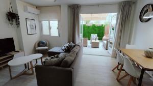 Et opholdsområde på Apartamento Bellaluz 0505 Resort Golf La Manga Club