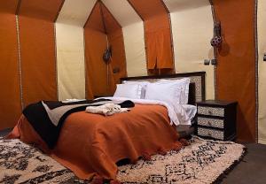 Postel nebo postele na pokoji v ubytování Royal Sands Camp