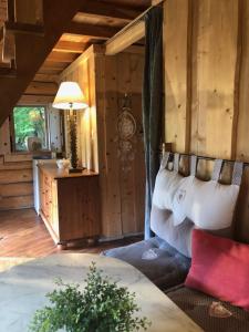 a living room with a couch and a table at Domaine La Roche Bellin in Descartes +58 photos