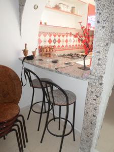 Kuchyň nebo kuchyňský kout v ubytování Studio Al Salam Djerba Midoun avec aspect architectural traditional bien fini