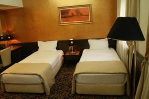 Postel nebo postele na pokoji v ubytování Hotel Hercegovina + 24 fotografií