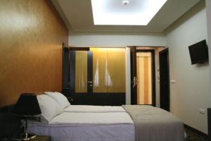Letto o letti in una camera di Hotel Hercegovina