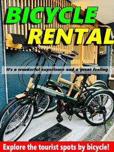 a magazine cover with two bikes parked outside a house at guesthouse大阪城 in Osaka