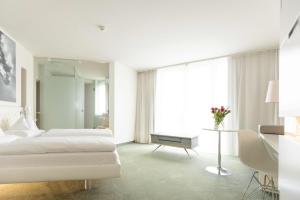 Posteľ alebo postele v izbe v ubytovaní Casinohotel Velden