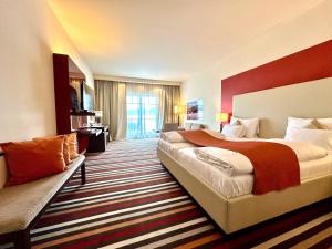 Posteľ alebo postele v izbe v ubytovaní Casinohotel Velden