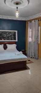 Letto o letti in una camera di Ma'a Lapseu hôtel
