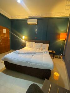 Letto o letti in una camera di Ma'a Lapseu hôtel