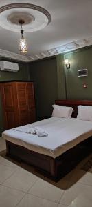 Letto o letti in una camera di Ma'a Lapseu hôtel