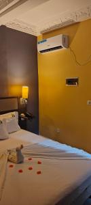 Letto o letti in una camera di Ma'a Lapseu hôtel