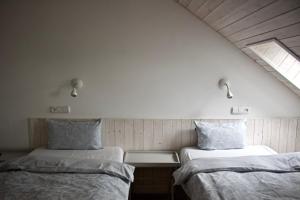 Łóżko lub łóżka w pokoju w obiekcie Casas Confort 256