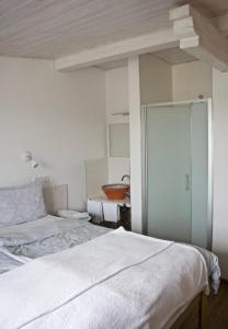 Łóżko lub łóżka w pokoju w obiekcie Casas Confort 256