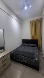 Ένα ή περισσότερα κρεβάτια σε δωμάτιο στο Rumah Surya 4 Bedrooms Bangi Kajang