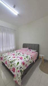 Ένα ή περισσότερα κρεβάτια σε δωμάτιο στο Rumah Surya 4 Bedrooms Bangi Kajang