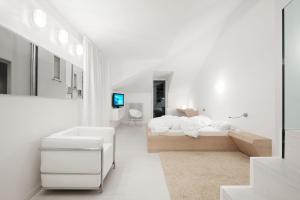 Postel nebo postele na pokoji v ubytování Boutique Hotel Imperialart