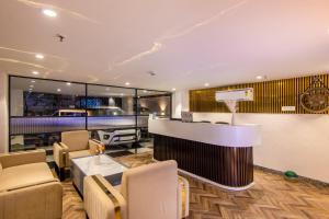 a bar in a room with a basketball hoop at The Orion Elite - Green Park in New Delhi