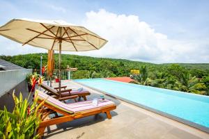 Bazén v ubytování The Hosteller Bam Goa, Assagao - Poshtel nebo v jeho okolí