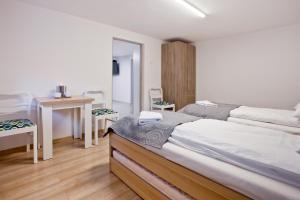 Posteľ alebo postele v izbe v ubytovaní Apartamenty DobraNocka + 37 fotografií