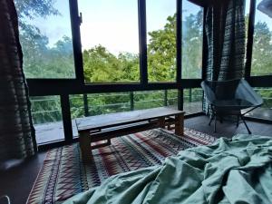 Ένα ή περισσότερα κρεβάτια σε δωμάτιο στο Le Home