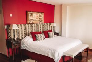 Cama ou camas em um quarto em Hotel Catedral Ski & Wellness