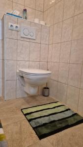 Koupelna v ubytování Graberhoehe Home