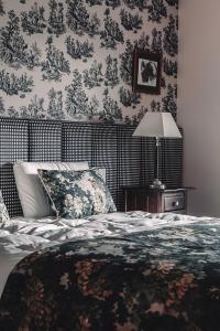Cama ou camas em um quarto em Hotel Catedral Ski & Wellness