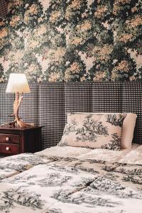 Cama ou camas em um quarto em Hotel Catedral Ski & Wellness