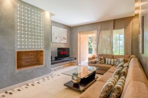 Χώρος καθιστικού στο Elegant Apartment in Prestigia Golf Marrakech